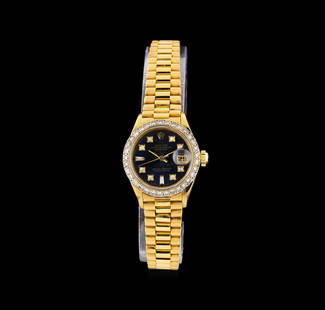 Rolex 18KT Gold Diamond DateJust Ladies Watch: One Rolex DateJust ladies watch featuring: Case: 18KT yellow gold. Bezel: Diamond set yellow gold. Crystal: Scratch-resistant sapphire. Dial: Deep blue color; diamond hour markers. Features: Date wind