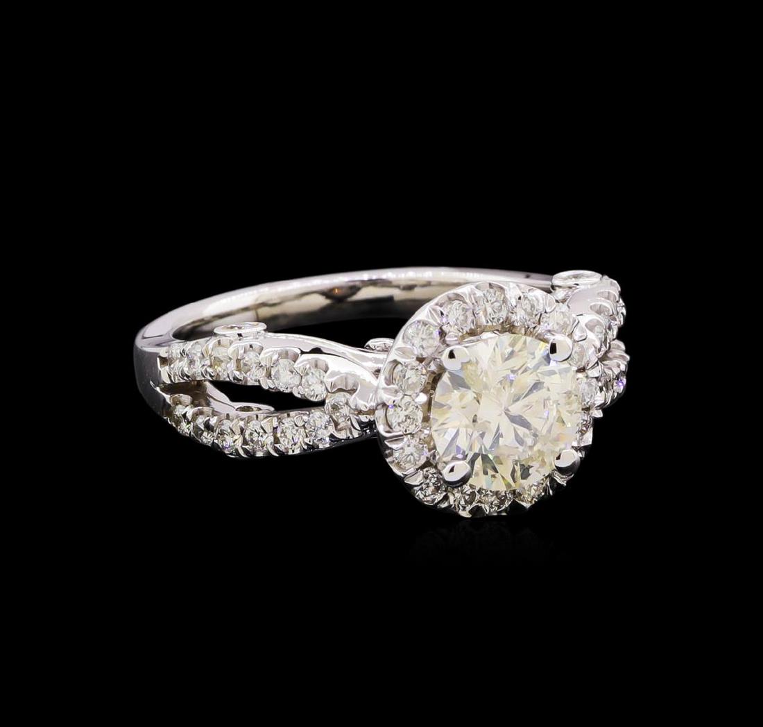 1.85 ctw Diamond Ring - 14KT White Gold: One electronically tested 14KT white gold lady's cast split shank wedding ring with a cathedral halo with a bright polish finish. Featured lady's ring has a shank measuring 2.07 millimeters in width. 