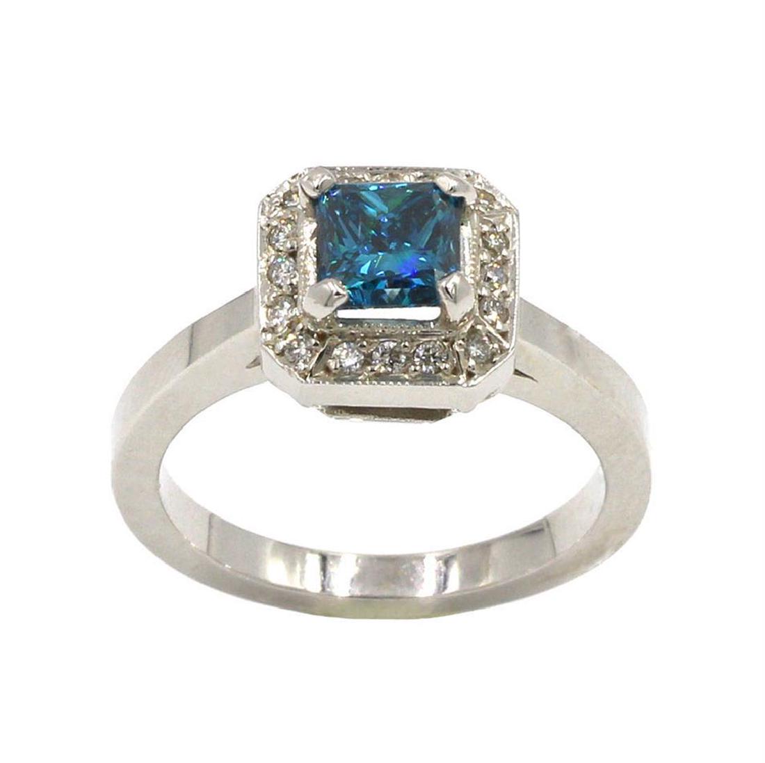 1.04 ctw Blue and White Diamond Ring - 18KT White Gold: One lady's wedding ring featuring: 18KT white gold weighing 6.60 grams containing one center blue diamond weighing 1.04ct and 16 white diamonds weighing 0.17ctw. The blue diamond is color enhanced, pr