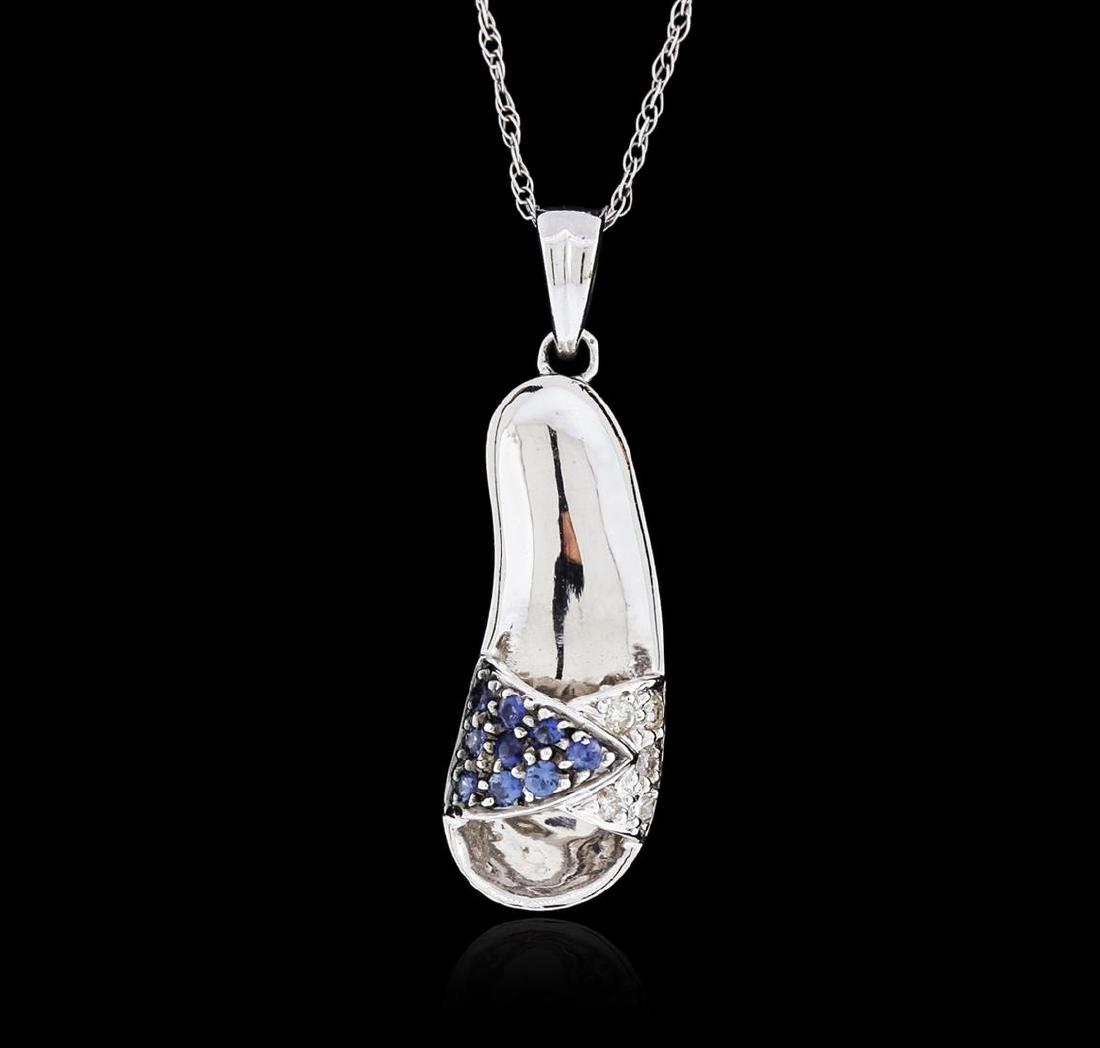 14KT White Gold 0.10 ctw Sapphire and Diamond Pendant: One sandal pendant with chain featuring: 14KT white gold weighing 3.10 grams containing blue sapphires with a total weight of 0.10ct and diamonds with a total weight of 0.05ct.