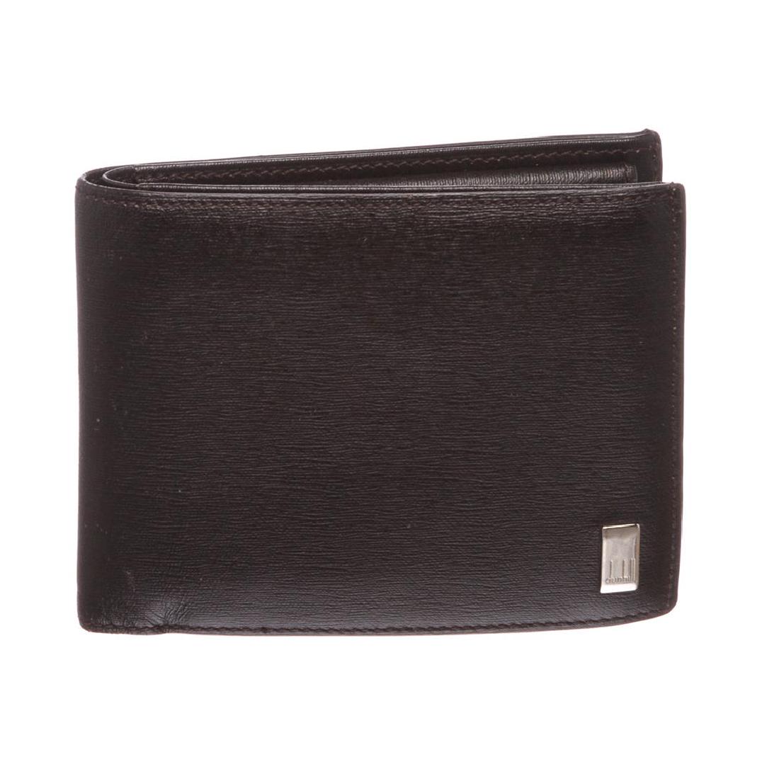 Dunhill Black Leather Bi Fold Wallet: Dunhill black leather bi fold wallet. Inner four card slot, money slip pocket, snap closure change pocket and leather lining.