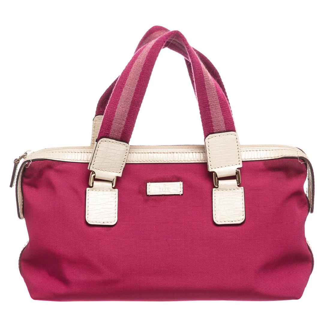 Gucci Pink White Nylon Leather Tote Bag: Pink and white Gucci nylon leather tote bag with silver-tone hardware, multicolor GG canvas interior lining, one zipper pocket at interior wall and overall zipper top closure.