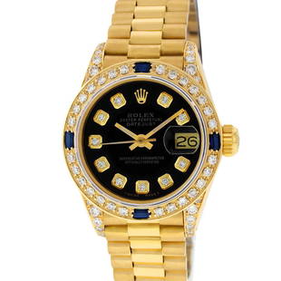 Rolex Ladies 18K Yellow Gold Black Diamond And Sapphire: One Ladies Rolex President Polished, Serviced & Electronically Tested, Yellow Gold Case With Diamond Lugs: 26mm G to H In Color, SI1, Yellow Gold Crown, Custom Diamond Lugs: 24 Diamonds On Lugs, Clari