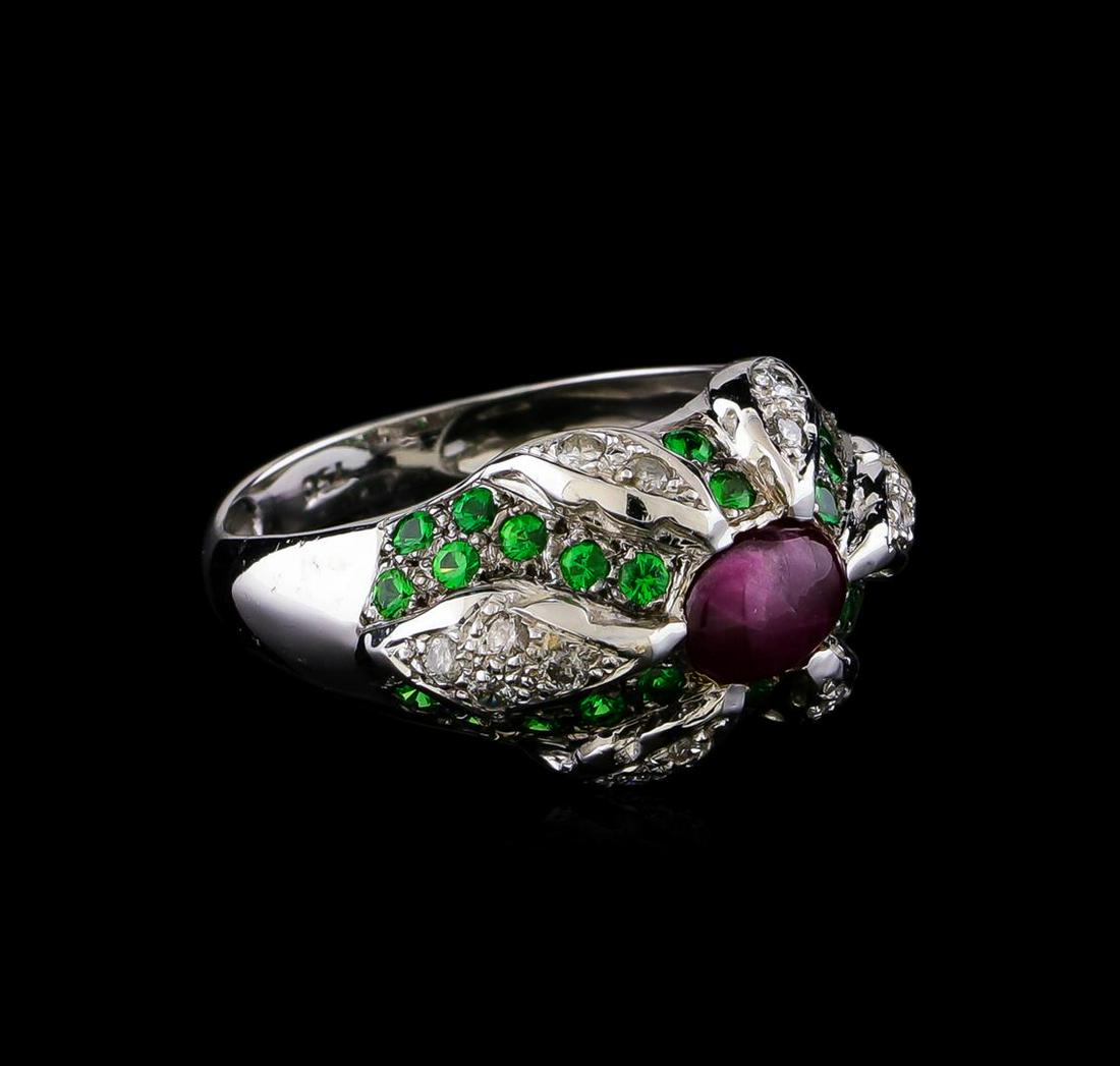 1.40 ctw Ruby, Tsavorite and Diamond Ring - 18KT White: One electronically tested 18KT white gold ladies cast ruby, tsavorite garnet and diamond ring. The ring features a ruby cabochon center set within draping tsavorite garnet and diamond ribbons, complet