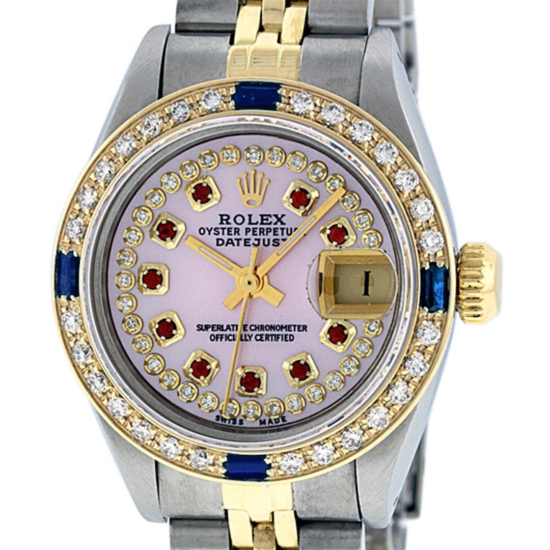 Rolex Ladies 2 Tone 14K Pink MOP Ruby & Sapphire: One Ladies 14K Two Tone Rolex Datejust Polished, Serviced & Electronically Tested, 14K Yellow Gold & Stainless Steel Case: 26mm, 14K Yellow Gold Crown, Custom Bezel: New 18K New Yellow Gold Sapphire B