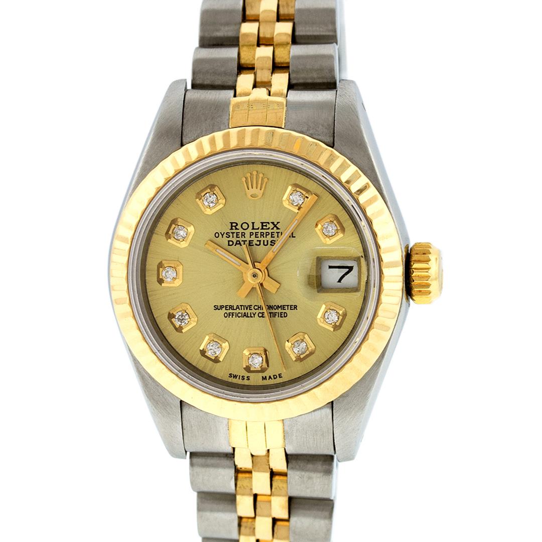 Rolex Ladies 2 Tone 14K Champagne Diamond 26MM Datejust: One Ladies 14K Two Tone Rolex Datejust Polished, Serviced & Electronically Tested, 14K Yellow Gold & Stainless Steel Case: 26mm, 14K Yellow Gold Crown, Bezel: 14K Yellow Gold Fluted Bezel. Custom Crys