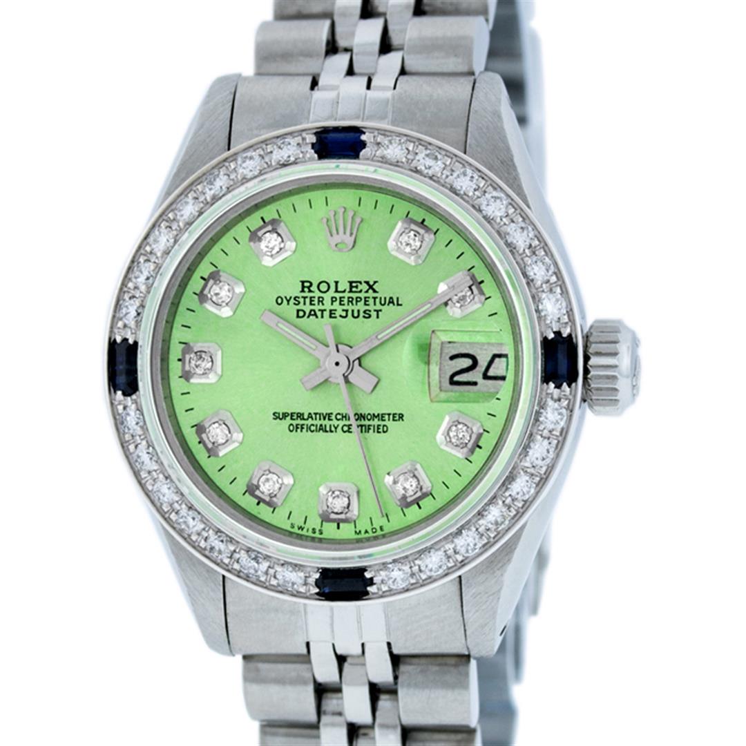 Rolex Ladies Stainless Steel Green Diamond & Sapphire: One Ladies Stainless Steel Rolex Datejust Polished Bright with Satin Finish, Serviced & Electronically Tested, Stainless Steel Case: 26mm, Stainless Steel Crown, Custom Bezel: New 18K White Gold Sapph