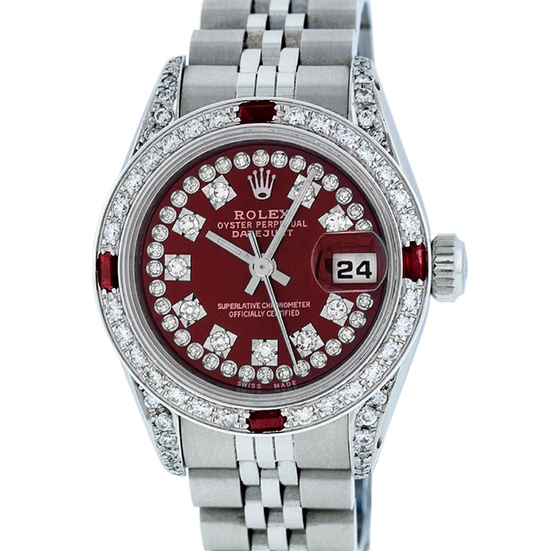 Rolex Ladies Stainless Steel 26MM Maroon Diamond Lugs: One Ladies Stainless Steel Rolex Datejust Polished Bright with Satin Finish, Serviced & Electronically Tested, Stainless Steel Case: 26mm, Stainless Steel Crown, Diamond Lugs: 24 Diamonds On Lugs, Cla