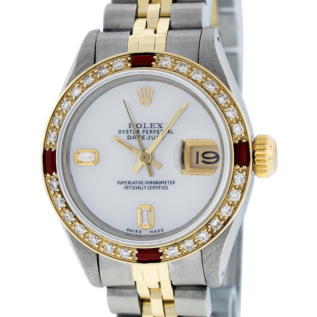 Rolex Ladies 2 Tone 14K MOP & Ruby Diamond Datejust: One Ladies 14K Two Tone Rolex Datejust Polished, Serviced & Electronically Tested, 14K Yellow Gold & Stainless Steel Case: 26mm, 14K Yellow Gold Crown, Custom Bezel: New 18K Yellow Gold Ruby Beadset D