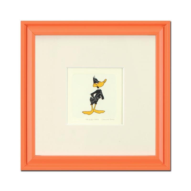 Daffy Duck by Looney Tunes: "Daffy Duck (Looking to the Side)" is a limited edition etching on paper with hand-tinted coloring from Warner Bros, numbered and dated 1999. This piece comes framed. Measures approx. 9" x 9" (with fr