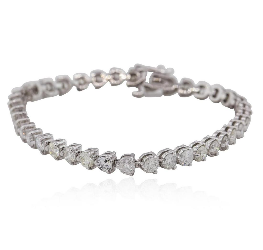 14KT White Gold 8.47 ctw Diamond Tennis Bracelet: One electronically tested 14KT white gold ladies combination cast & assembled tennis bracelet with a hidden box clasp with safety closer with a bright polish finish. Measurements: 7 in length. Identif