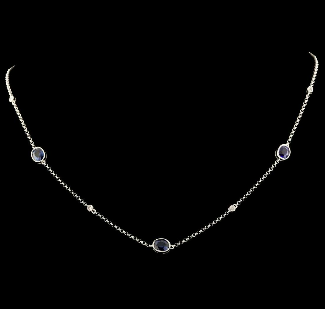 2.50 ctw Sapphire and Diamond Necklace - 18KT White: One electronically tested 18KT white gold lady's combination cast & assembled diamonds by the yard necklace with a lobster claw clasp with a bright polish with milgrain detailing finish. The featured 