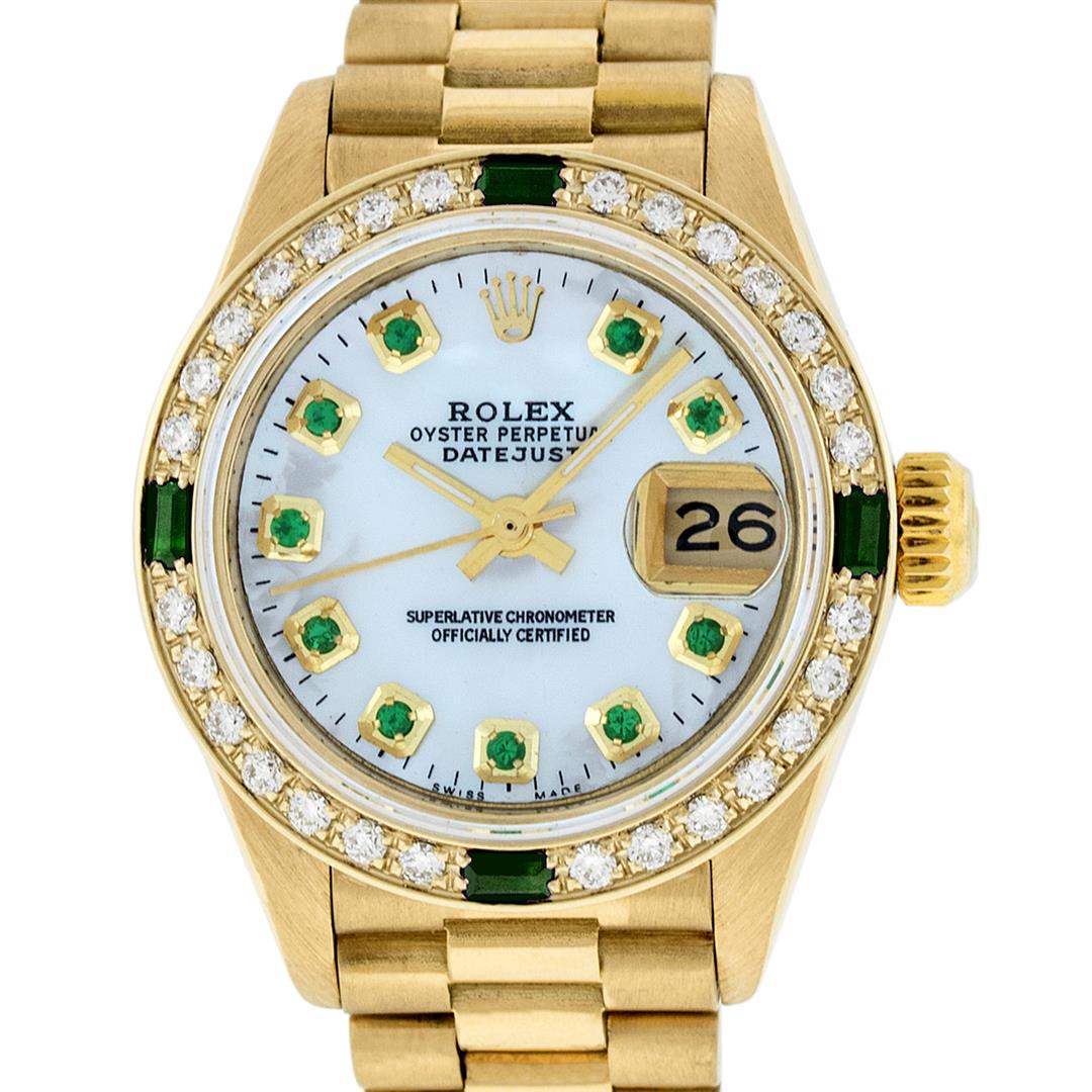 Rolex Ladies 18K Yellow Gold MOP Emerald President: One Ladies 18K Yellow Gold Rolex President Polished, Serviced & Electronically Tested, Yellow Gold Case: 26mm, 18K Yellow Gold Crown, Custom Bezel: New 18K Yellow Gold Emerald Beadset Diamond Bezel, D
