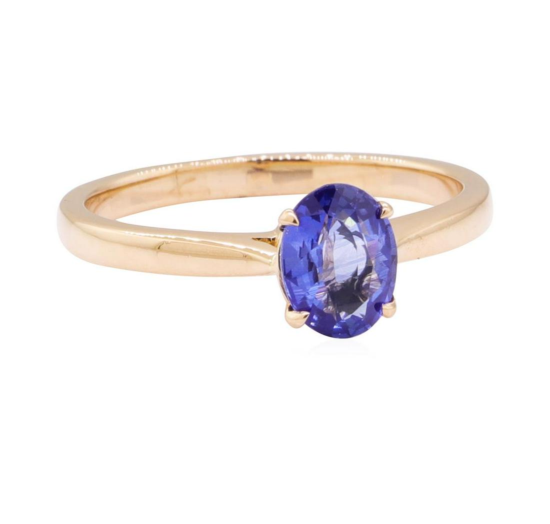 0.98 ctw Blue Sapphire Ring - 18KT Rose Gold: One ring featuring: 18KT rose gold weighing 2.8 grams containing one oval cut blue sapphire weighing 0.98ct. The ring has a solitaire motif.