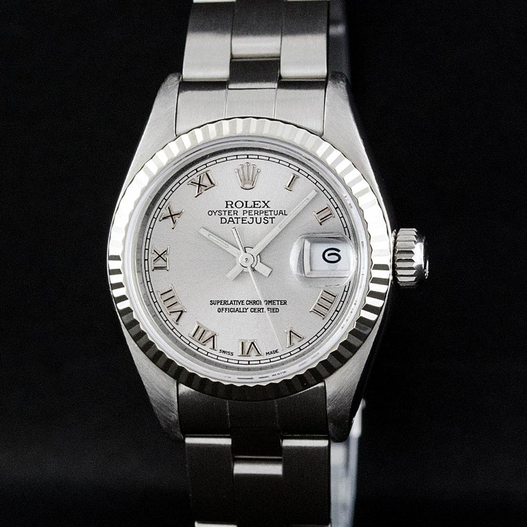 Rolex Ladies Stainless Steel Slate Grey 26MM Oyster: One Ladies Stainless Steel Rolex Datejust Polished Bright with Satin Finish, Serviced & Electronically Tested, Stainless Steel Case: 26mm, Stainless Steel Crown, Bezel: 14K White Gold Bezel. Custom Cr