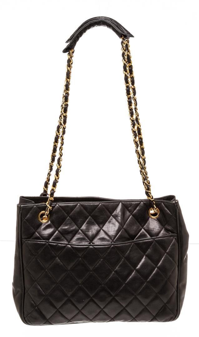 Chanel Black Lambskin Leather Vintage Tote Shoulder Bag: One Chanel Black Lambskin Leather Vintage Tote Shoulder Bag. Chanel black Lambskin leather vintage tote shoulder bag with gold-tone hardware, black leather lining, dual interior zip pockets, dual exte