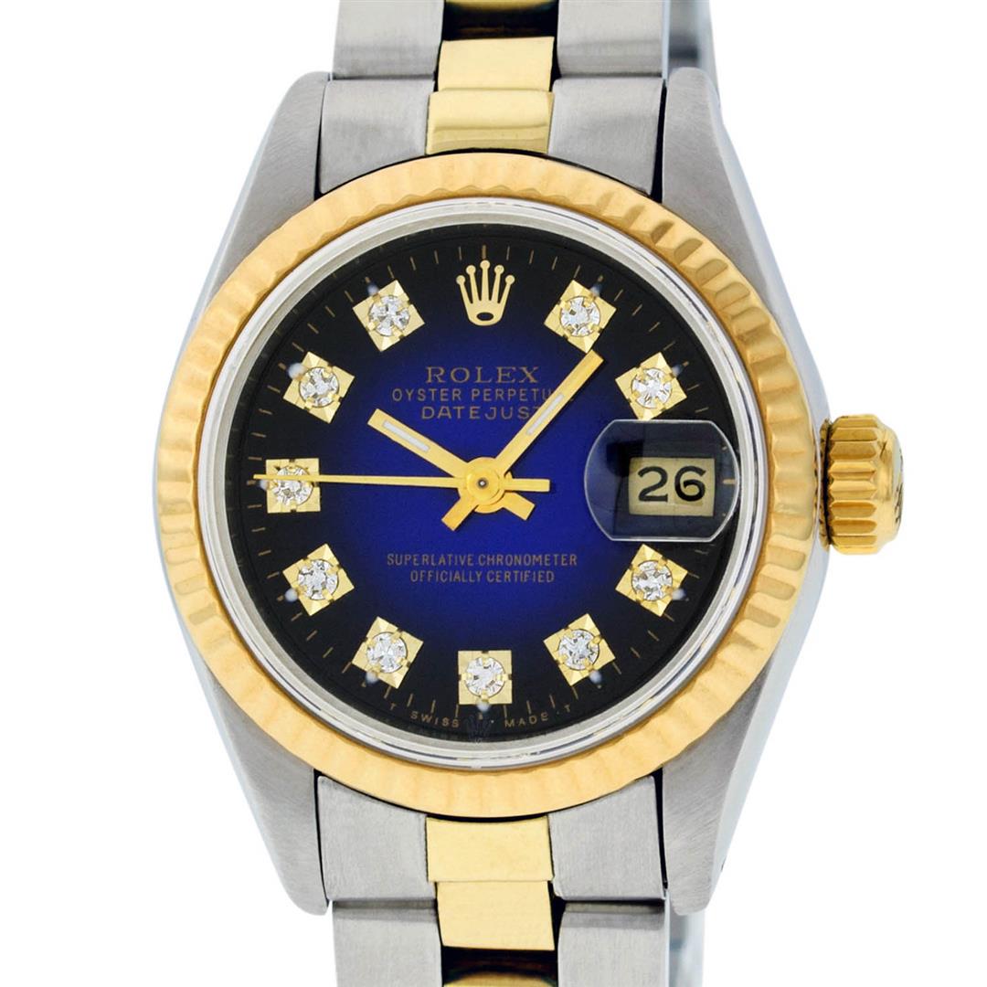 Rolex Ladies 2 Tone 14K Blue Vignette Diamond Datejust: One Ladies 14K Two Tone Rolex Datejust Polished, Serviced & Electronically Tested, 14K Yellow Gold & Stainless Steel Case: 26mm, 14K Yellow Gold Crown, Bezel: 14K Yellow Gold Fluted Bezel. Custom Crys