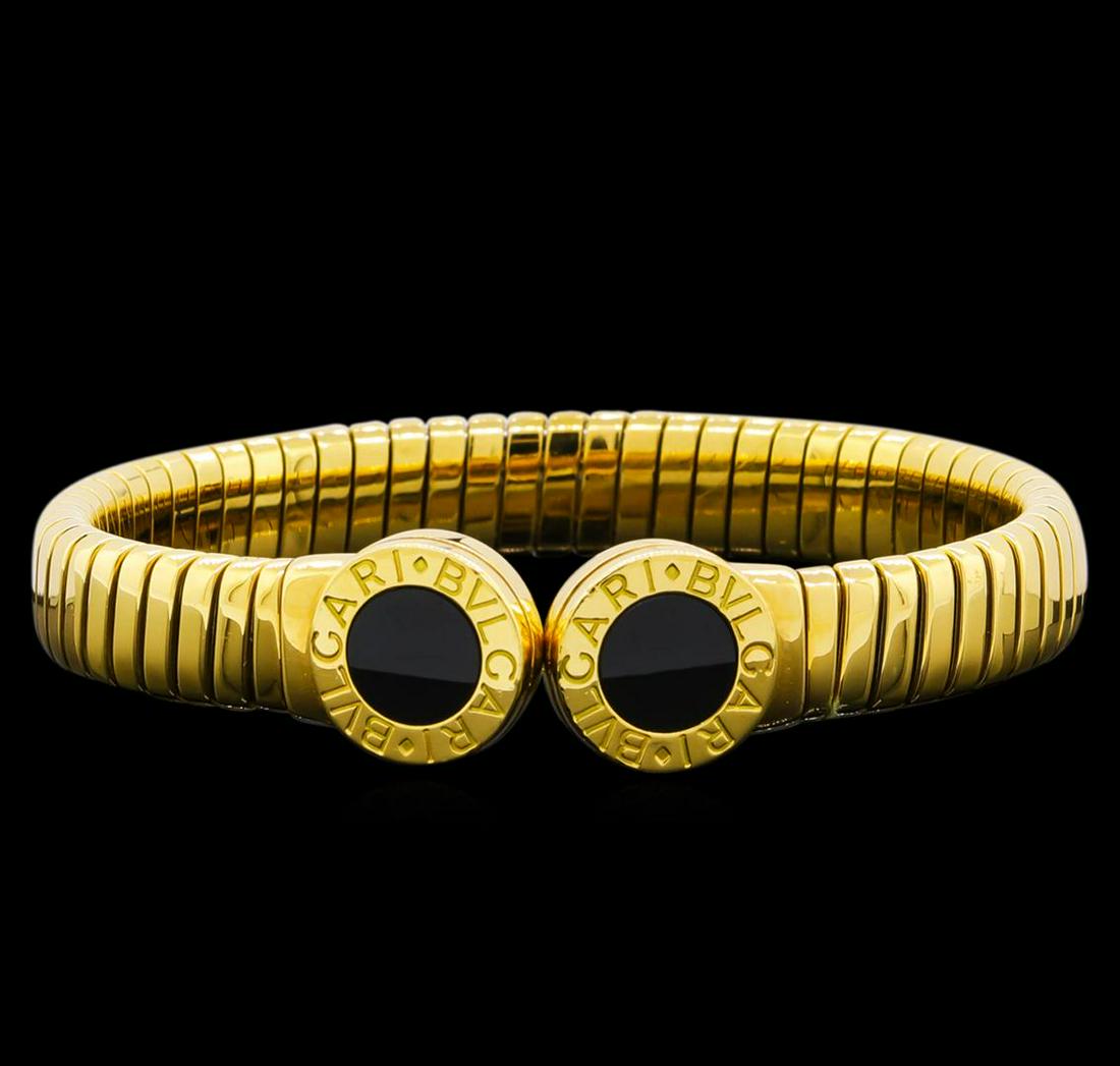 Bvlgari 18KT Yellow Gold Cuff Bracelet: One Bvlgari cuff bracelet featuring: 18KT yellow gold weighing 40.20 grams.