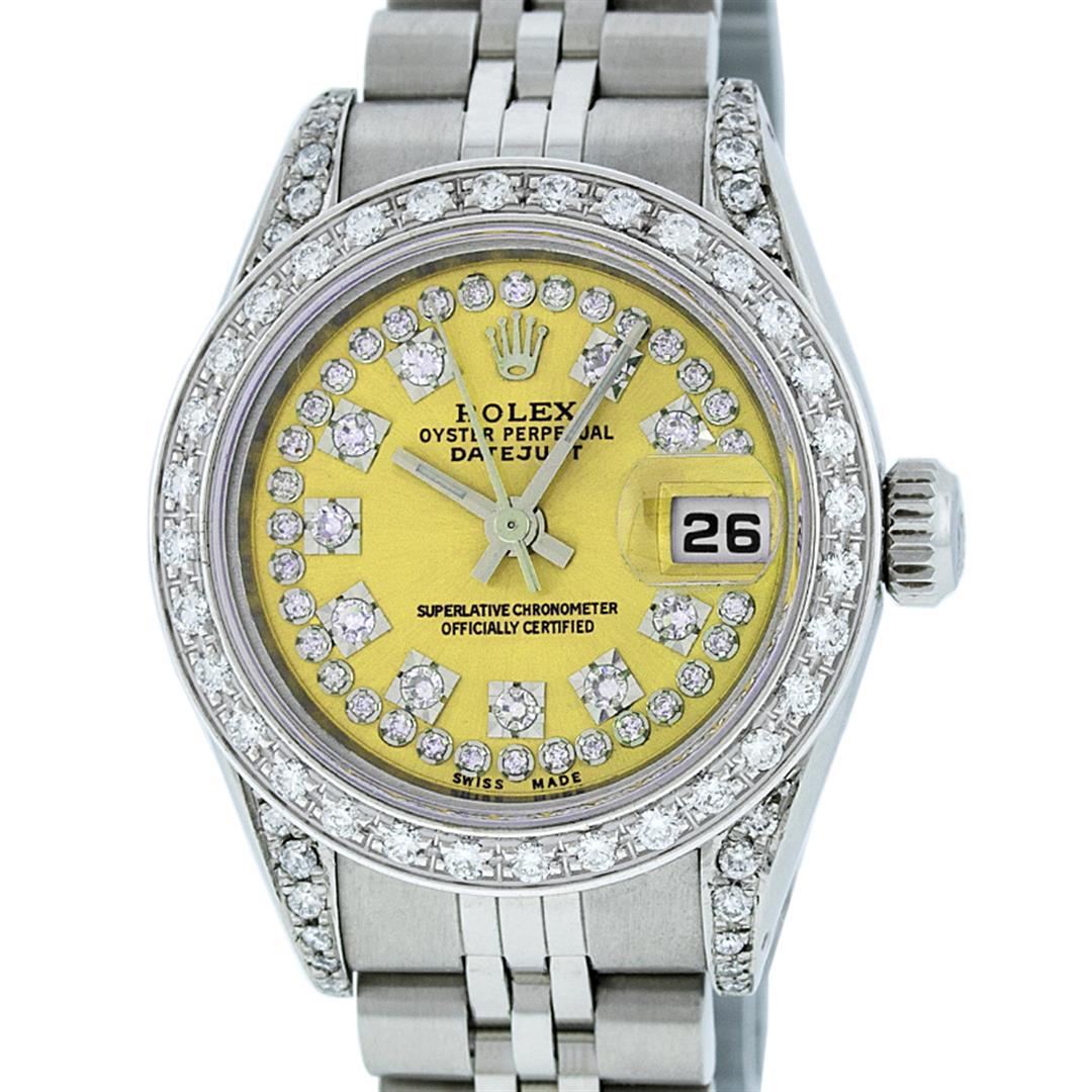 Rolex Ladies Stainless Steel 26MM Yellow String Diamond: One Ladies Stainless Steel Rolex Datejust Polished Bright with Satin Finish, Serviced & Electronically Tested, Stainless Steel Case: 26mm, Stainless Steel Crown, Custom Diamond Lugs: 24 Diamonds On Lu