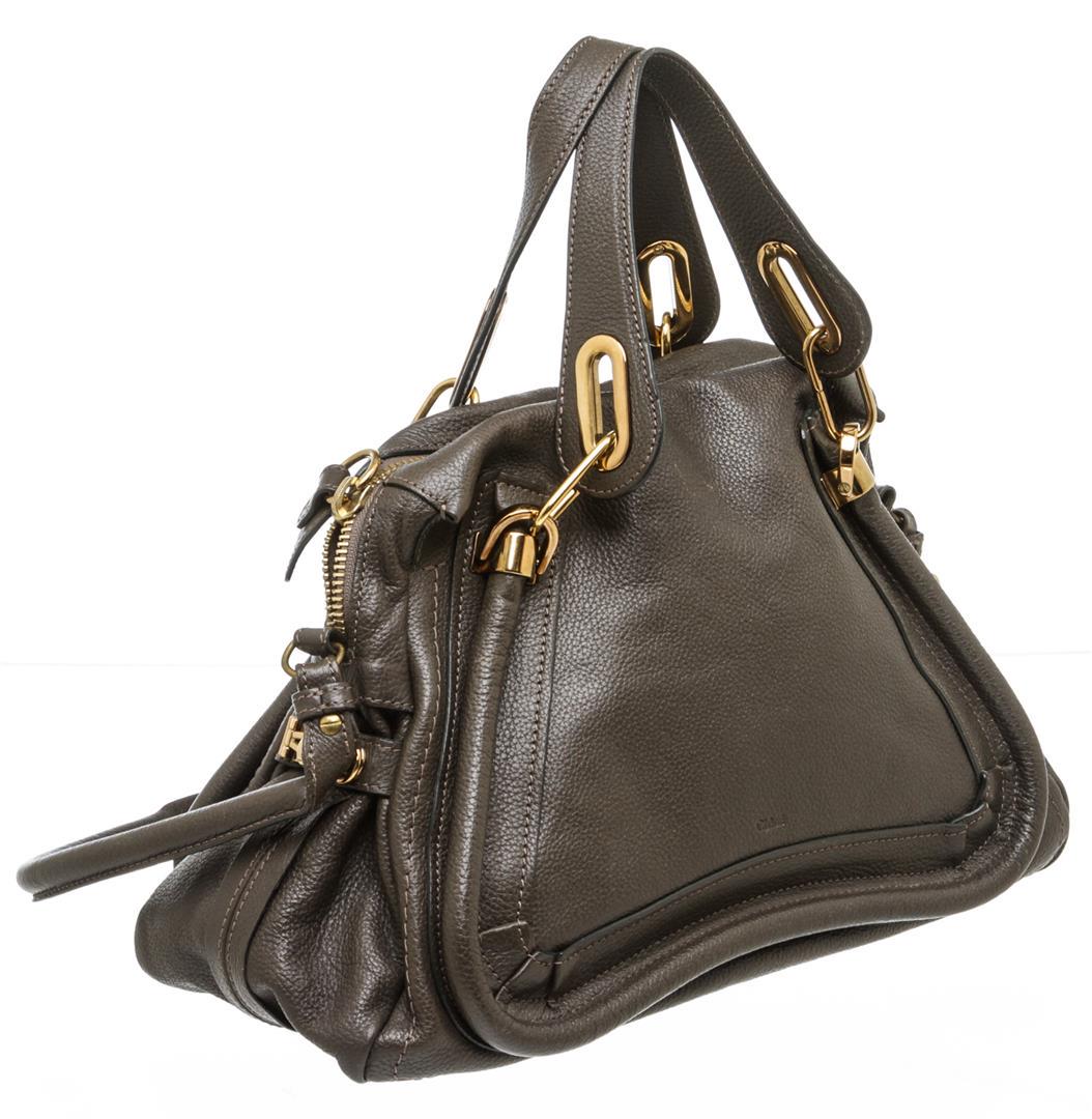 Chloe Brown Leather Paraty Medium Satchel Handbag: One Chloe Brown Leather Paraty Medium Satchel Handbag. Crafted out of brown leather, dual flat handles, gold tone hardware, and zip top closure. Inner is brown fabric lined with one side zip pocket. M