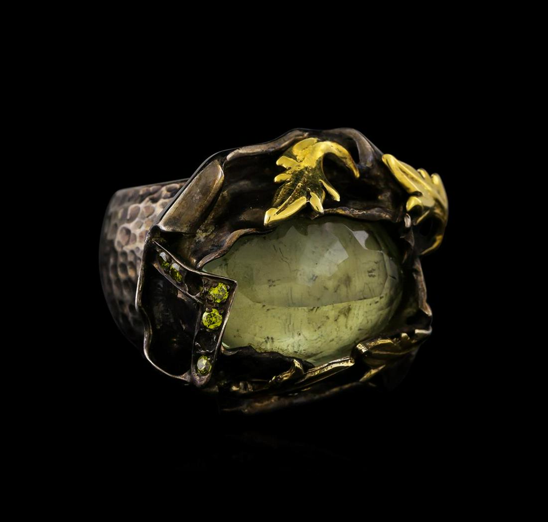 Sterling Silver Ring: One of a kind high fashion sterling silver Ring weighing 32.1 grams. Black Antique texture. Containing: Green Quartz, Yellowish Green Crystal. This sterling silver promises a lasting shine.