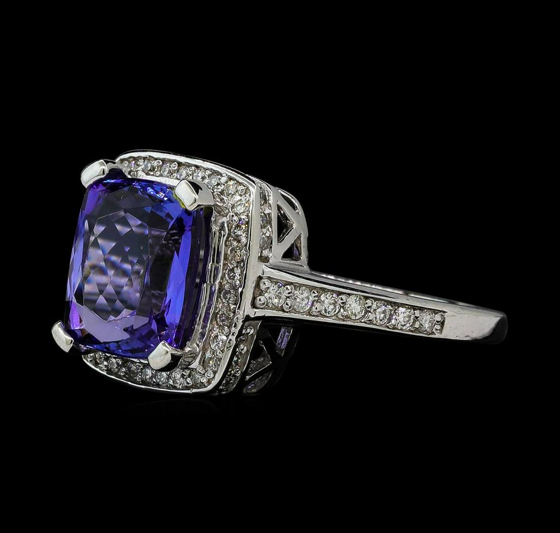 3.91 ctw Tanzanite and Diamond Ring - 14KT White Gold: One ring including: 14KT White Gold containing Tanzanite with a total weight of 3.91 ct. and Diamonds with a total weight o f 0.43 ctw.