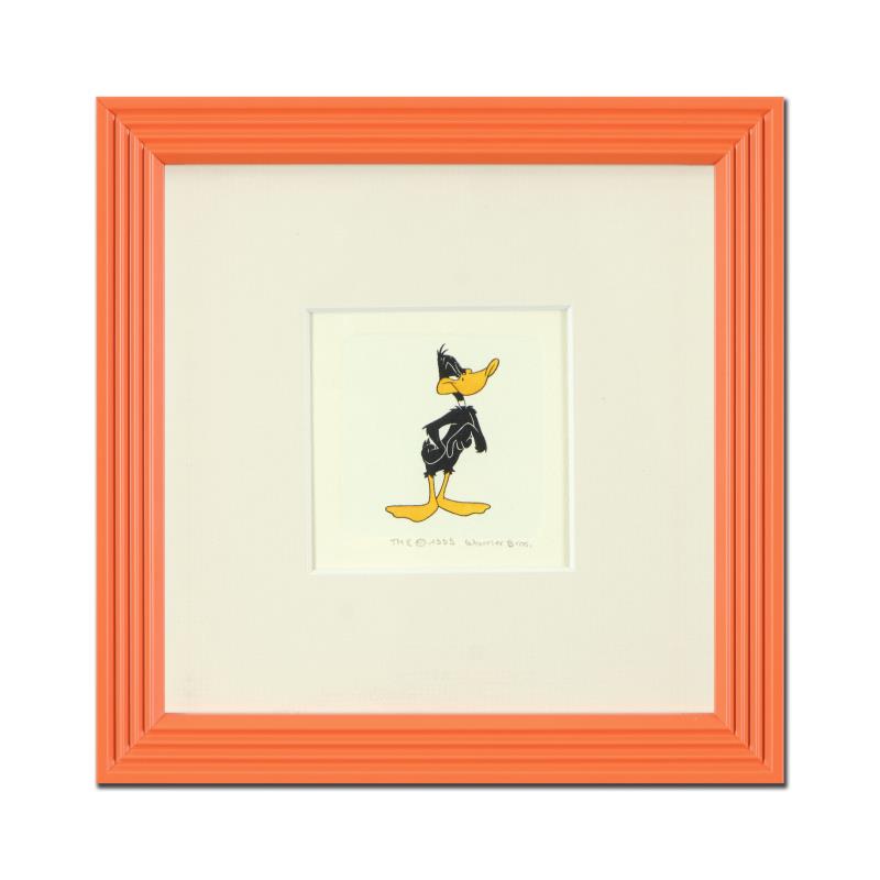 Daffy Duck by Looney Tunes: "Daffy Duck (Looking to the Side)" is a limited edition etching on paper with hand-tinted coloring from Warner Bros, numbered and dated 1999. This piece comes framed. Measures approx. 9" x 9" (with fr