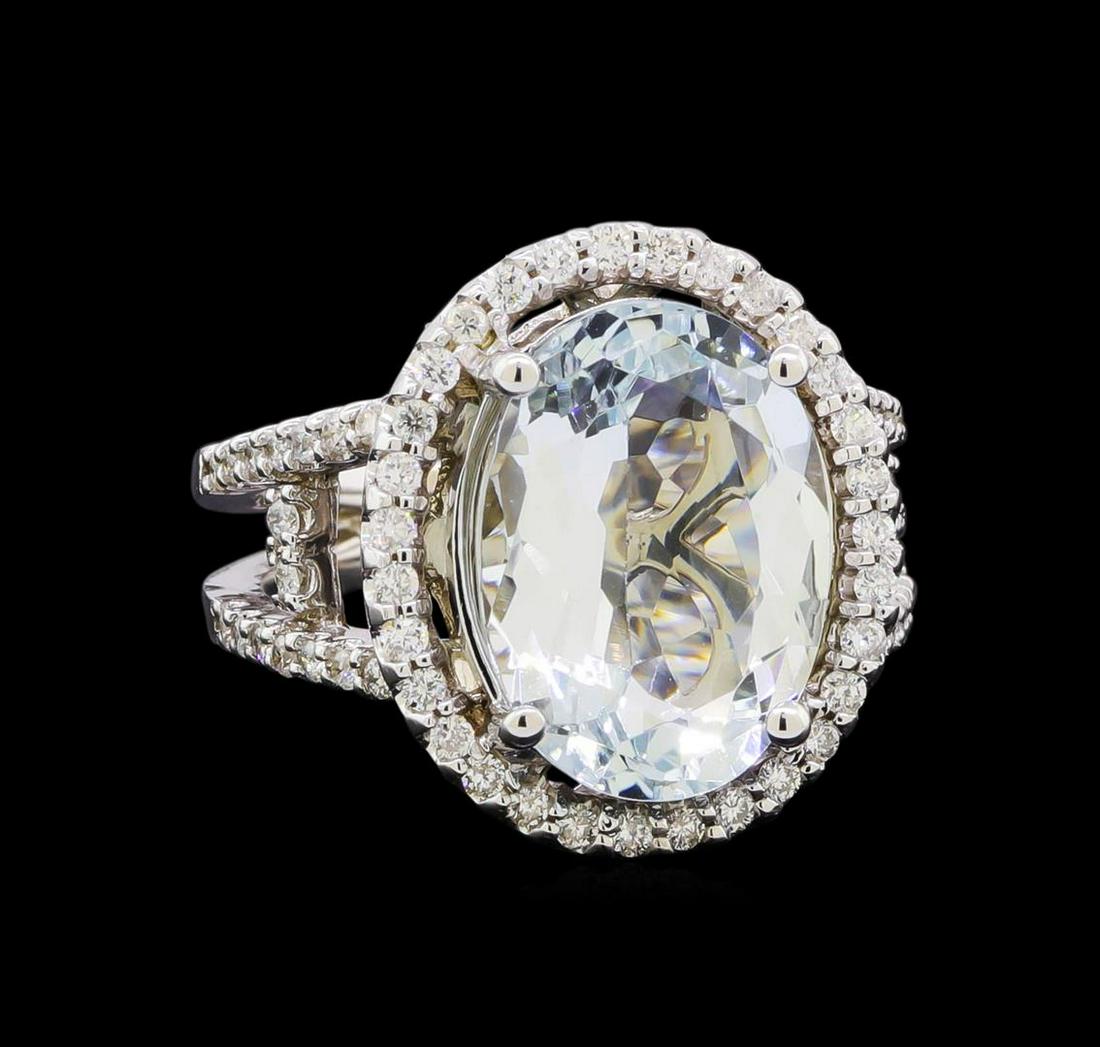 5.25 ctw Aquamarine and Diamond Ring - 14KT White Gold: One electronically tested 14KT white gold lady's cast fashion halo ring with a split shank with a bright polish finish. Featured lady's ring has a shank measuring 3.55 millimeters in length. Identifie