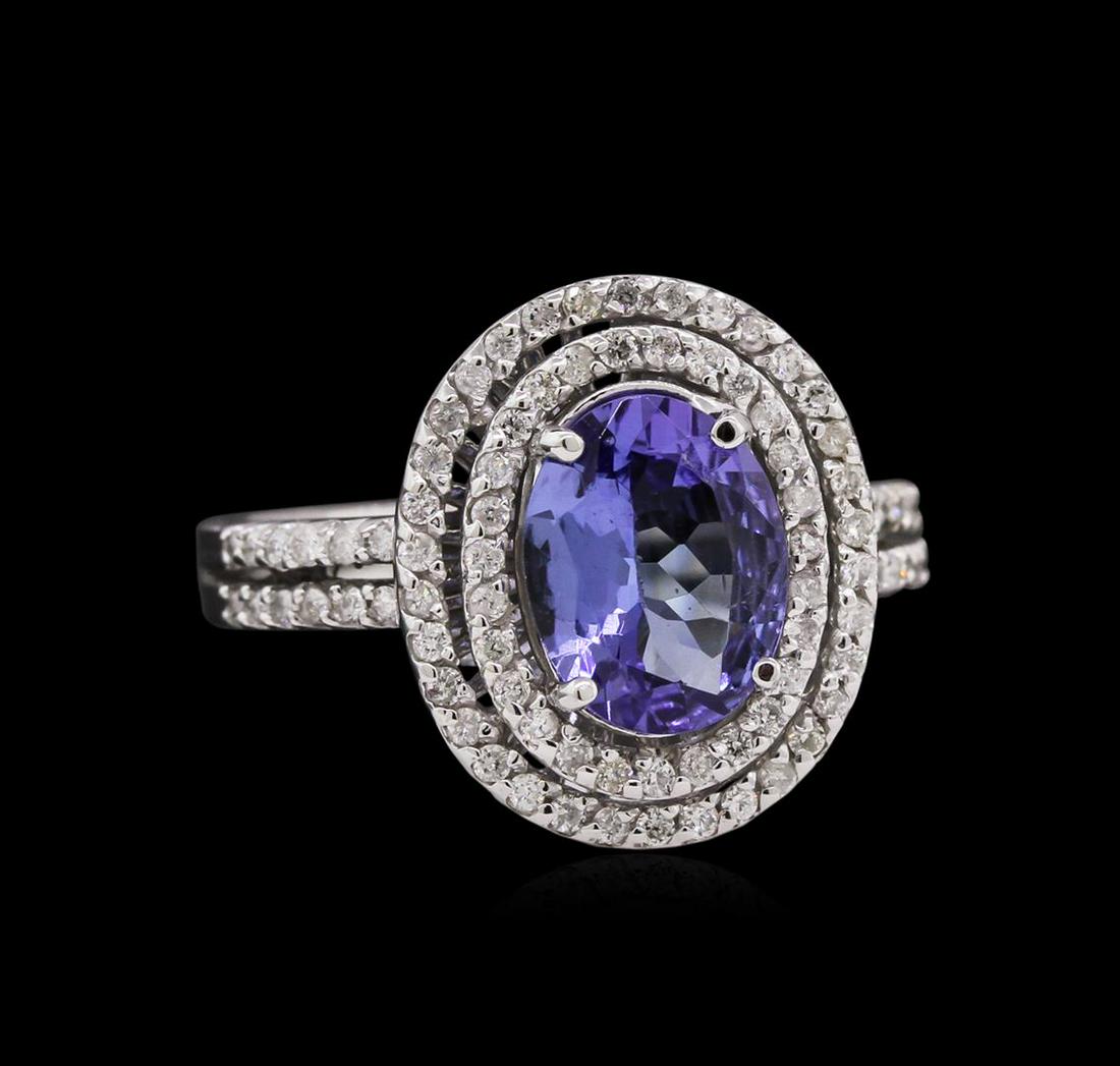 1.48 ctw Tanzanite and Diamond Ring - 14KT White Gold: One ring featuring: 14KT white gold weighing 5.18 grams containing 1 tanzanite with a total weight of 1.48ct and diamonds with a total weight of 0.42ct.