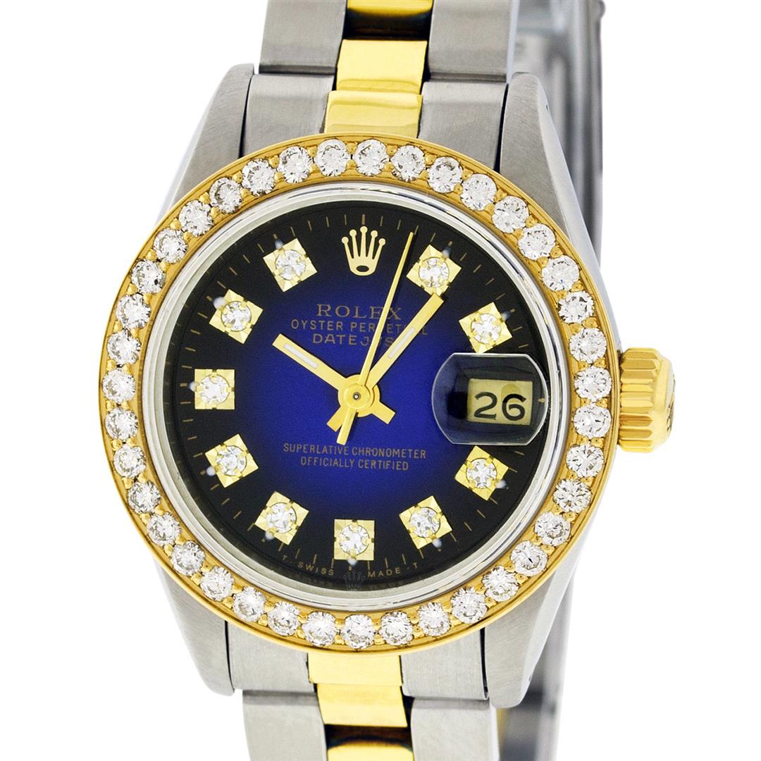 Rolex Ladies 2 Tone Yellow Gold Blue Vignette VS: One Ladies Two Tone Yellow Gold Rolex Datejust Polished, Serviced & Electronically Tested, Yellow Gold & Stainless Steel Case: 26mm, Yellow Gold Crown, Custom Bezel: New 18K 1ctw Yellow Gold Beadset D