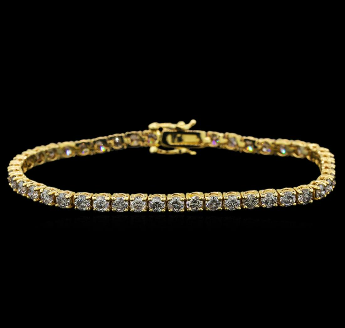 14KT Yellow Gold 5.01 ctw Diamond Tennis Bracelet: One electronically tested 14KT yellow gold ladies cast diamond tennis bracelet with a hidden box clasp with safety closer with a bright polish finish. Measurements: 7" in length Identified with markin