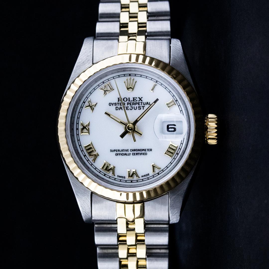 Rolex Ladies 2 Tone Yellow Gold Yellow Gold & Stainless: One Ladies Two Tone Yellow Gold Rolex Datejust Polished, Serviced & Electronically Tested, Yellow Gold & Stainless Steel Case: 26mm, Yellow Gold Crown, Bezel: Yellow Gold Fluted Bezel. Custom Crystal: