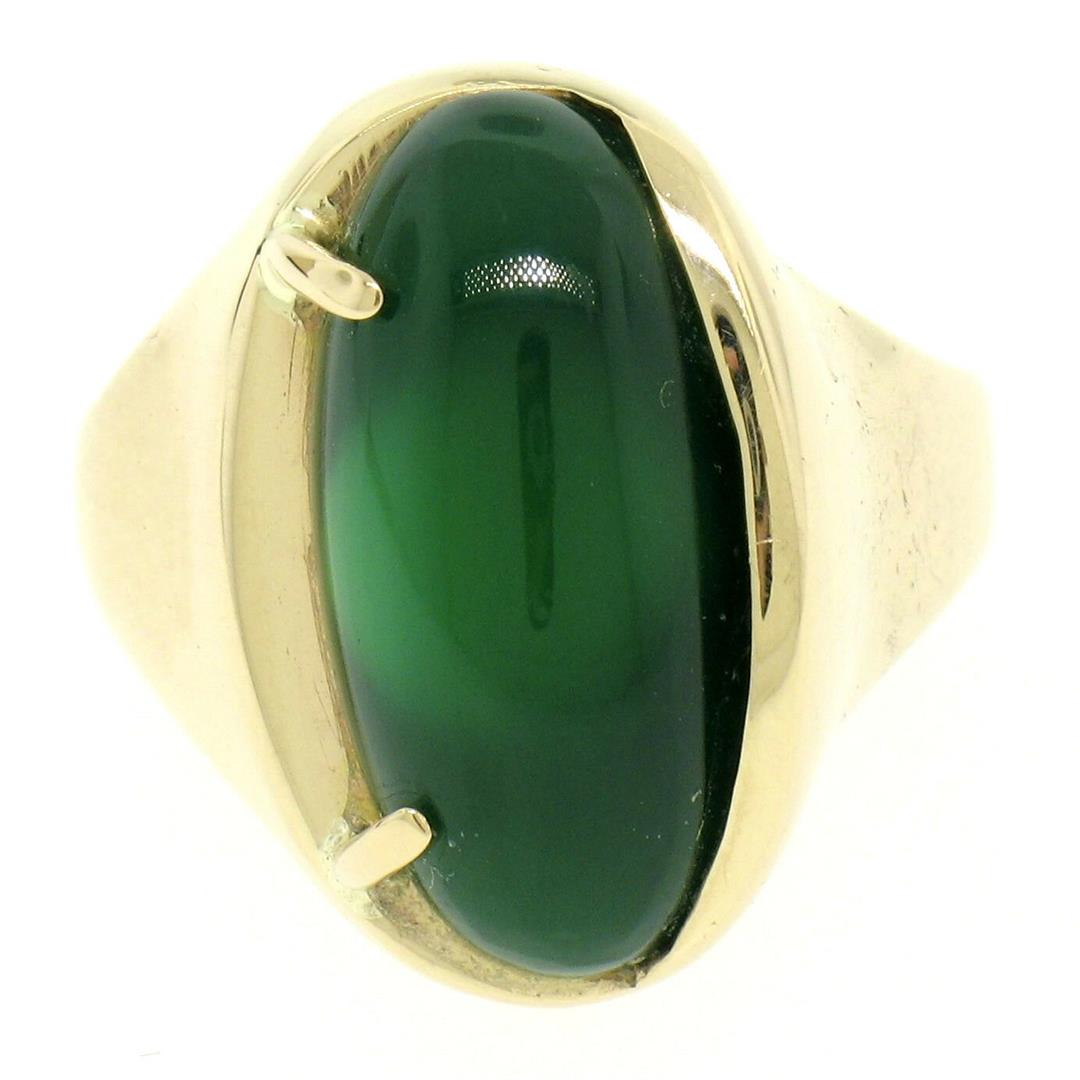 Men's 14k Yellow Gold Oval Cabochon Green Onyx: One Men's 14k Yellow Gold Oval Cabochon Natural Green Onyx Solitaire Ring Size 6.5. Item Details: Material: 14k Solid Yellow Gold, Weight: 10.5 Grams, Stone(s): (1) Natural Genuine Onyx - Oval Cabocho