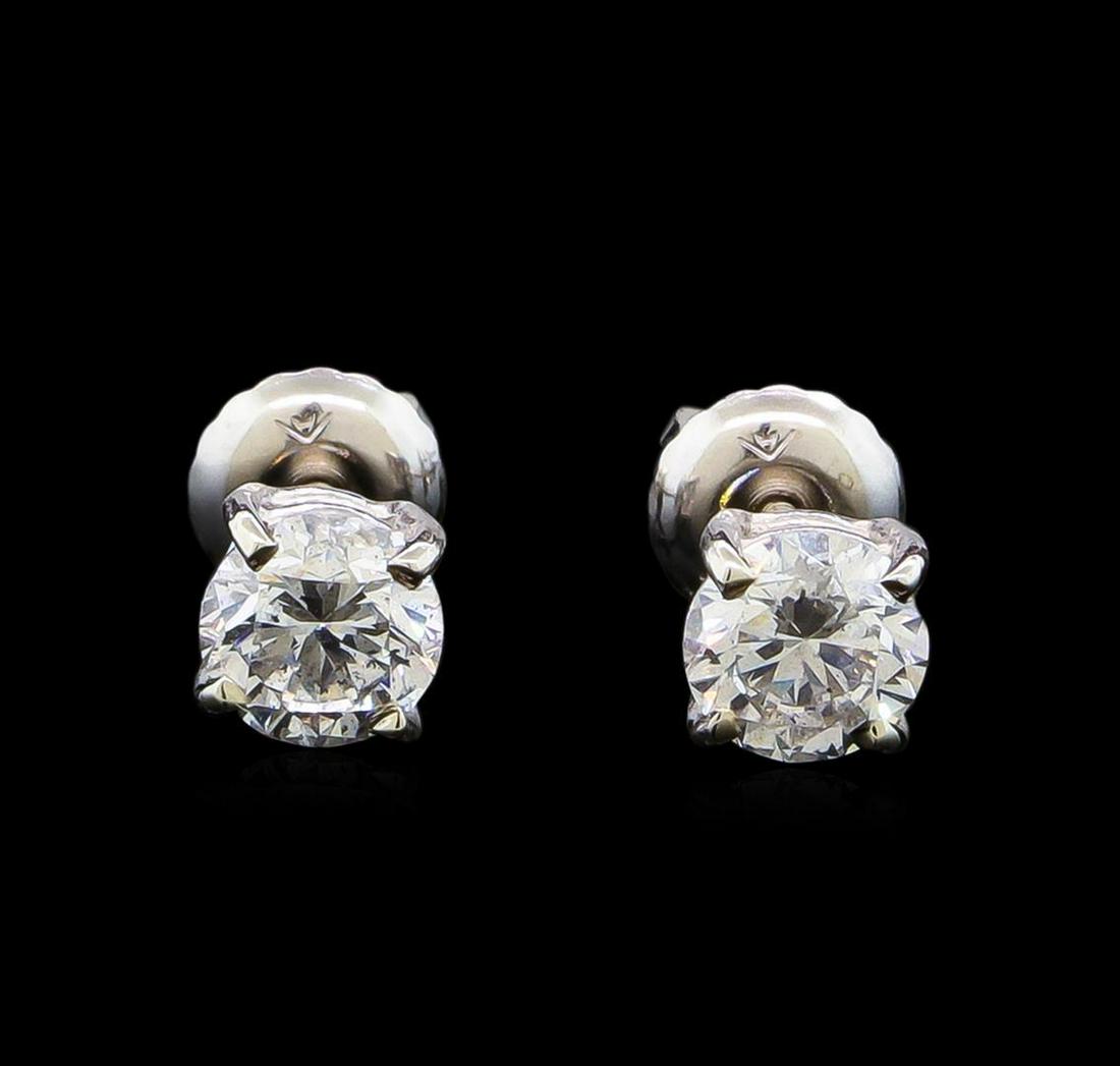 1.02 ctw Diamond Stud Earrings - 14KT White Gold: One pair electronically tested 14KT white gold lady's combination cast & assembled diamond stud earrings with threaded posts and screw-on/screw-off backs with a basket setting with a bright polish fin