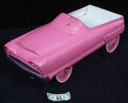 vintage pink pedal car