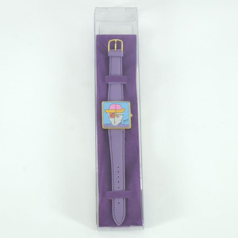 Peter Max Watch (Face) by Peter Max: This is a vintage Peter Max "Face" wrist watch created for the Japanese market in 1991. This watch comes in the original packaging and with paperwork. Due to the age of the watch the battery will need