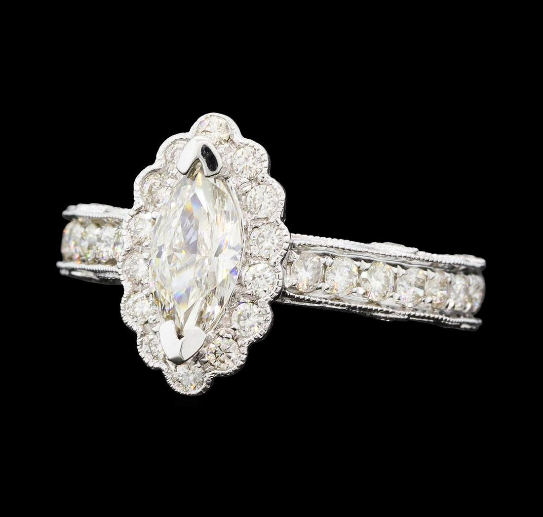 1.80 ctw Diamond Ring - 14KT White Gold: One electronically tested 14KT white gold lady's cast vintage style wedding ring with a cathedral shank with a basket halo with a bright polish with milgrain detailing finish. The featured lady's ring