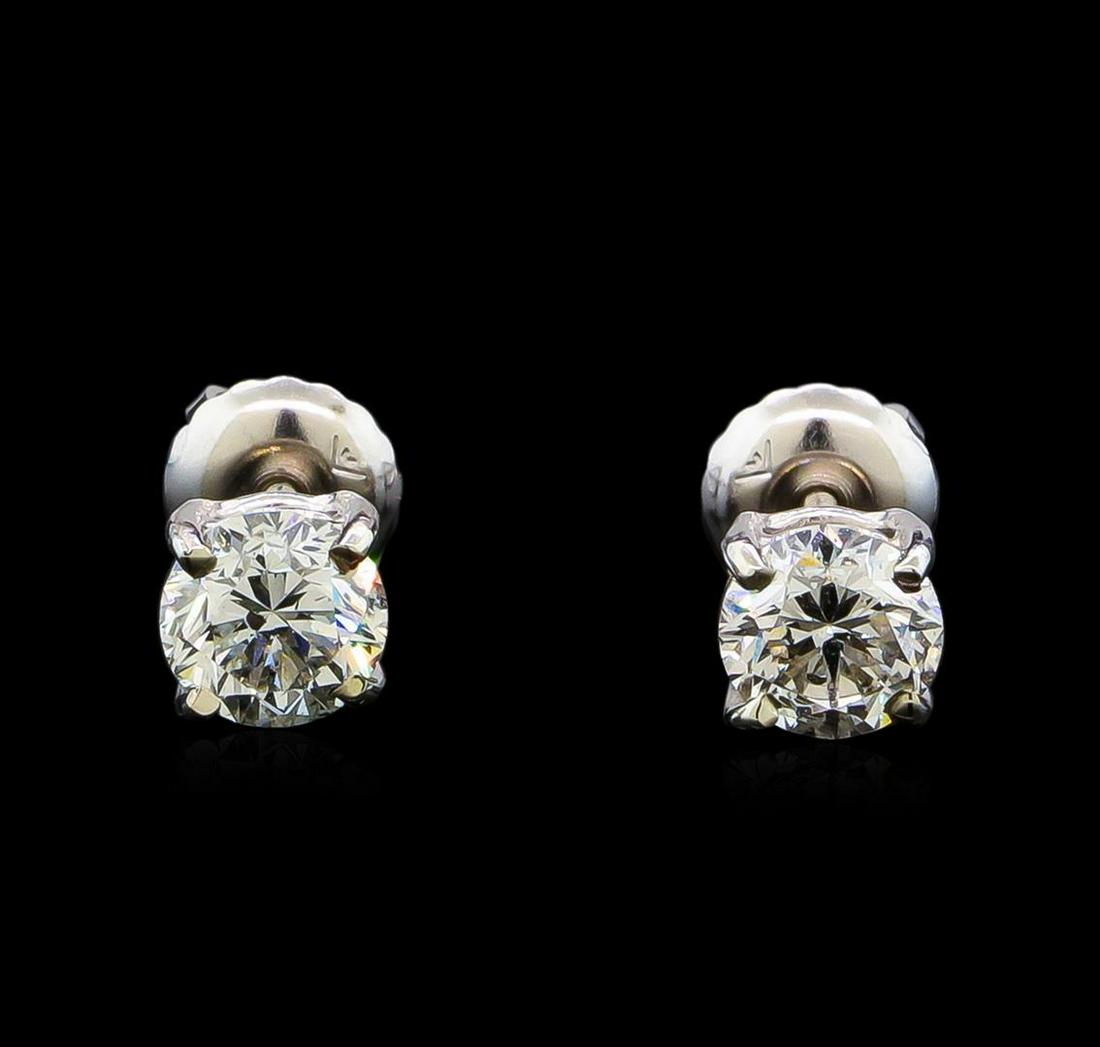 1.06 ctw Diamond Stud Earrings - 14KT White Gold: One pair electronically tested 14KT white gold lady's combination cast & assembled diamond stud earrings with threaded posts and screw-on/screw-off backs with a basket setting with a bright polish fin