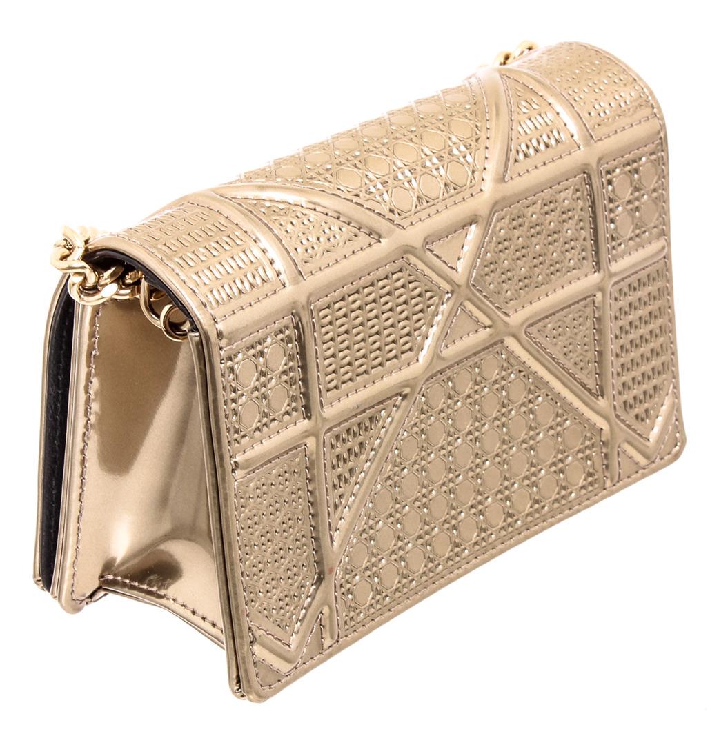 Dior Metallic Champagne Patent Leather Baby Diorama: Dior metallic champagne patent leather Baby Diorama crossbody with gold-tone hardware, chain link shoulder strap, leather interior lining, three interior pockets with card slots and overall snap closu