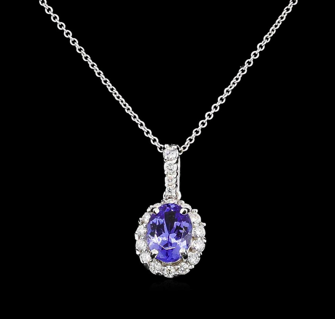 2.30 ctw Tanzanite and Diamond Pendant With Chain -: One pendant with chain : 14KT white gold weighing 2.40gm containing one tanzanite stone with a total weight of 2.30ct. and diamonds weighing 0.45ctw.