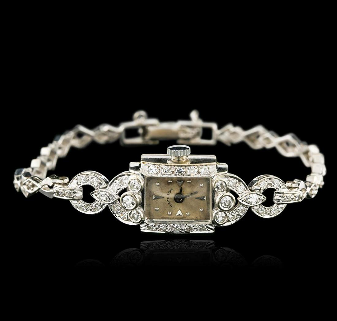 Hamilton 14KT White Gold Diamond Vintage Ladies Watch: One ladies, vintage Hamilton wristwatch electronically tested 14KT White gold, Case: 19 x 14.50mm, Case Back: space available for engraving, Flexible Case Lug terminals: set with diamonds, Fixed Case 