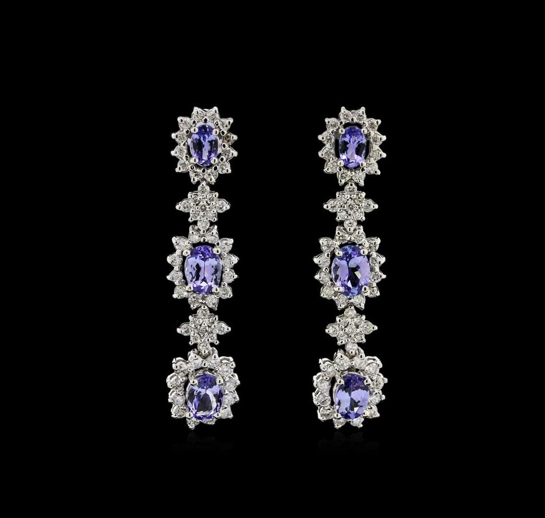 4.48 ctw Tanzanite and Diamond Earrings - 14KT White: One pair electronically tested 14KT white gold lady's combination cast & assembled fashion earrings with friction posts with a bright polish finish. Identified with markings of "585". Condition is new