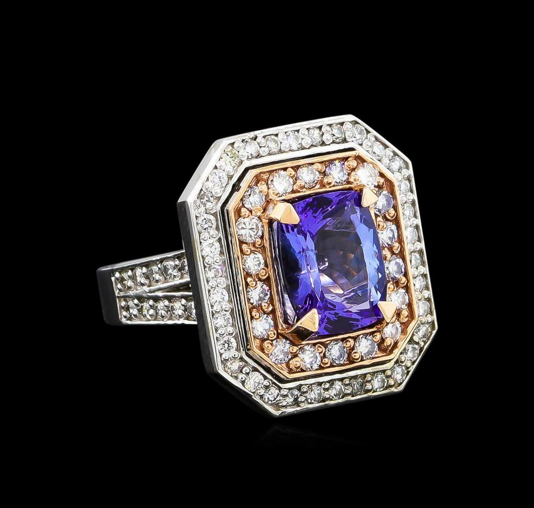 14KT Rose and White Gold 3.10 ctw Tanzanite and Diamond: One electronically tested 14KT rose and white gold Ladies combination cast & assembled ring with a bright polish finish. Condition is new. Identified with markings of "K14". Containing: One prong set 