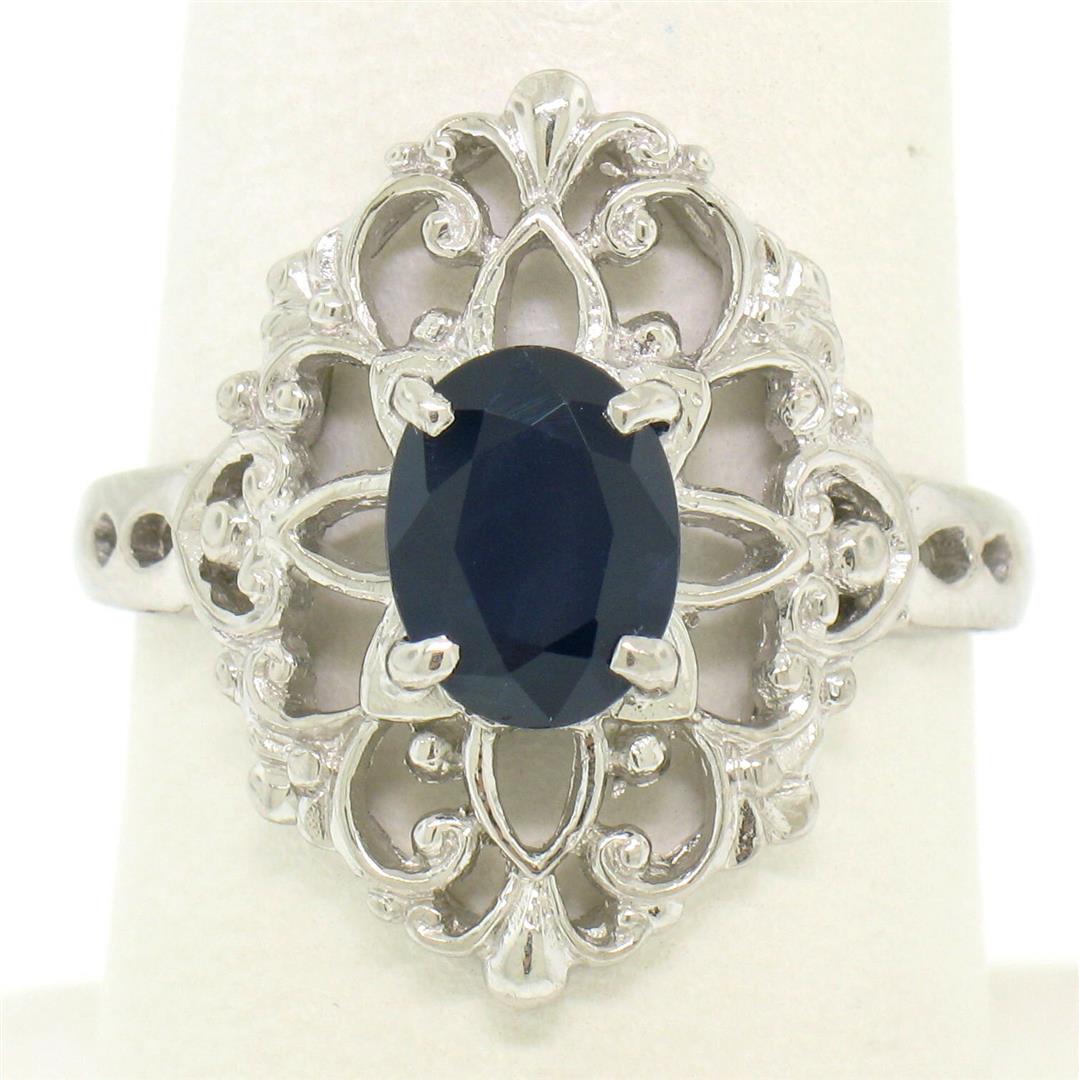Solid Platinum 1.22 ctw Oval Deep Blue Sapphire: One Solid Platinum 1.22ct Oval Deep Blue Sapphire Solitaire Open Filigree Style Ring. Item Details: Material: Solid Platinum, Weight: 5.5 Grams, Stone(s): (1) Natural Genuine Sapphire - Oval Cut - Pro