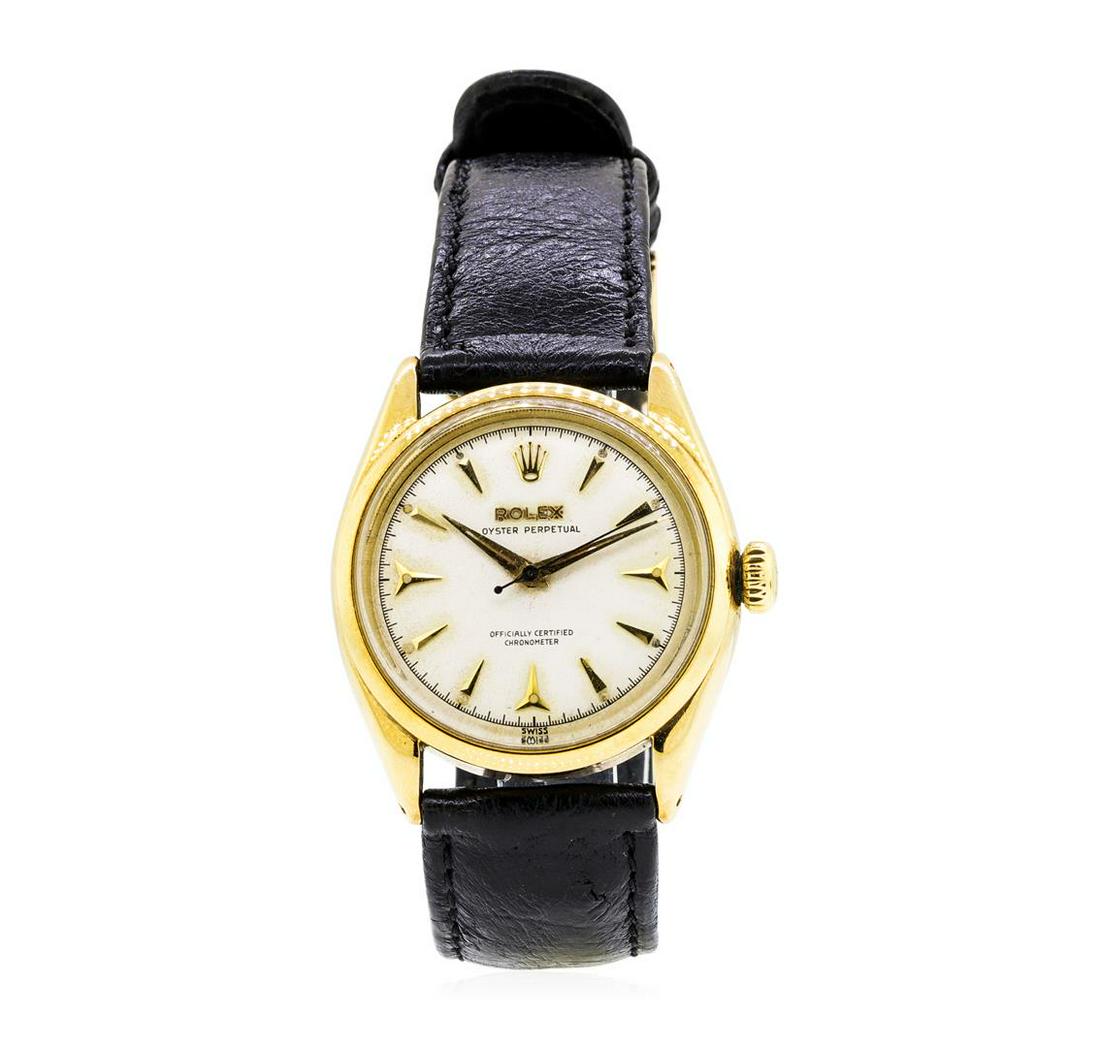 Rolex Oyster Perpetual Wristwatch - 14KT Yellow Gold: One man's, hand crafted and machine milled Rolex round case Oyster Perpetual wrist watch electronically tested 14KT yellow gold, Crown: gold screw-down, Bezel: gold, Crystal: acrylic, Movement: 25 jew