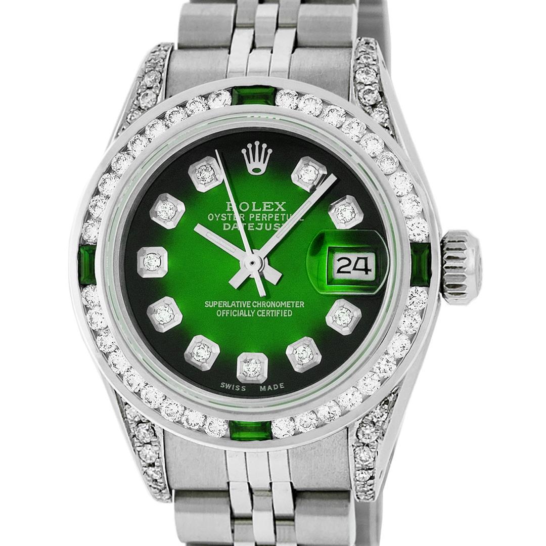 Rolex Ladies SSS Green Vignette Diamond Lugs & Emerald: One Ladies Stainless Steel Rolex Datejust Polished Bright with Satin Finish, Serviced & Electronically Tested, Stainless Steel Case: 26mm, Stainless Steel Crown, Diamond Lugs: 24 Diamonds On Lugs, Cla