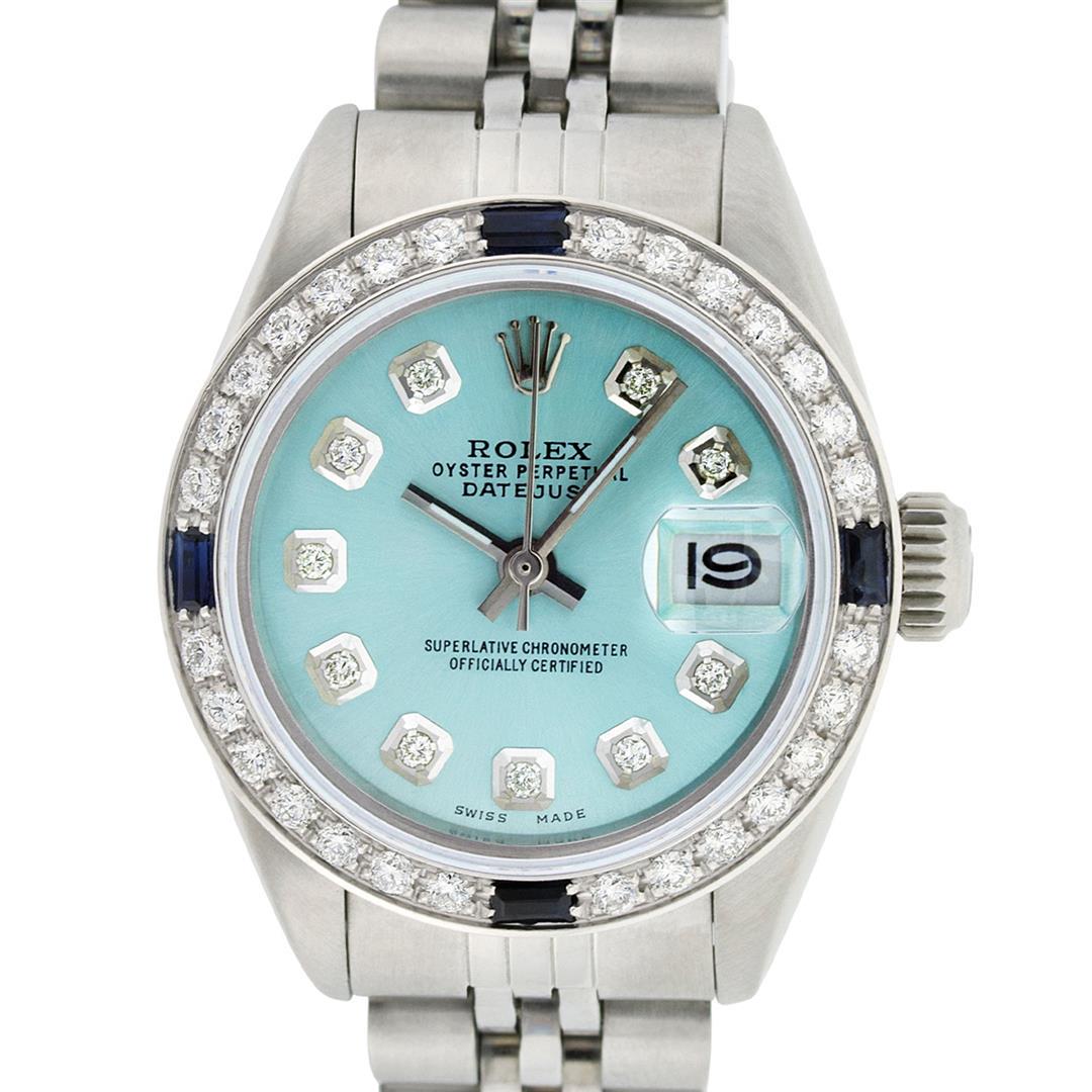 Rolex Ladies Stainless Steel Ice Blue Diamond 26MM: One Ladies Stainless Steel Rolex Datejust Polished Bright with Satin Finish, Serviced & Electronically Tested, Stainless Steel Case: 26mm, Stainless Steel Crown, Bezel: 14K White Gold Bezel. Custom Cr