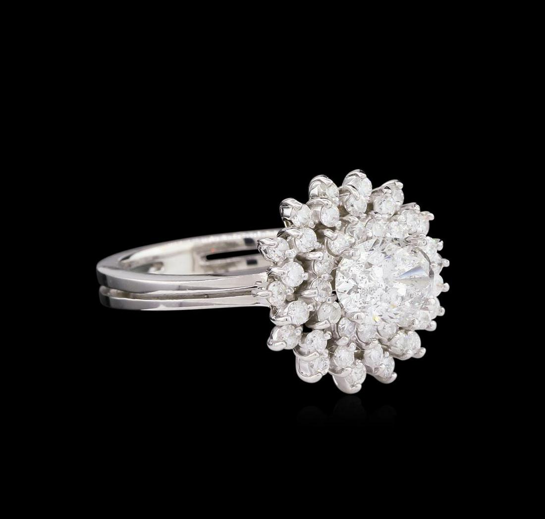 1.73 ctw Diamond Ring - 14KT White Gold: One electronically tested 14KT white gold lady's cast wedding ring with a split shank double halo with a bright polish finish. The featured lady's ring has a shank measuring 2.98 millimeters wide. Ide