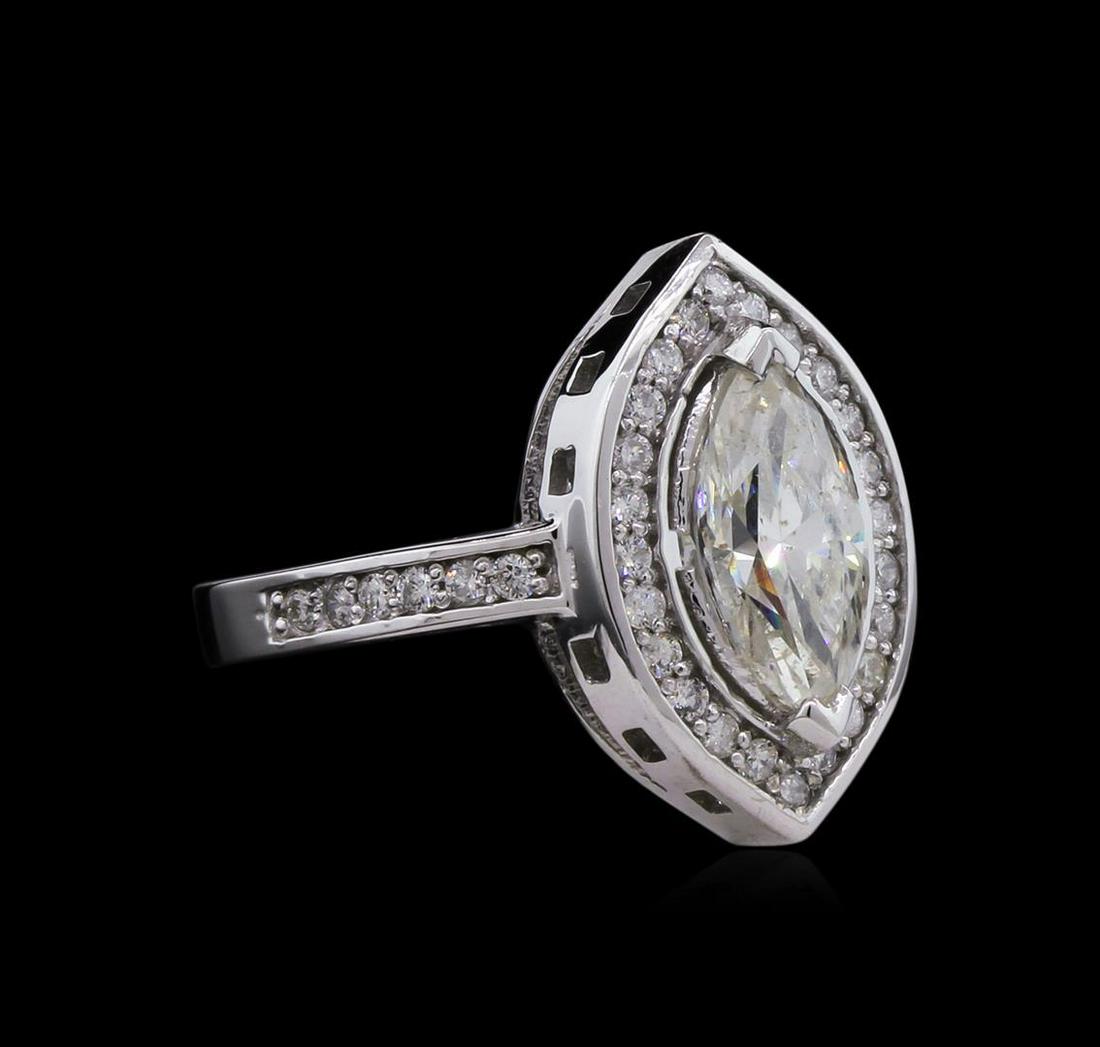 1.76 ctw Diamond Ring - 14KT White Gold: One electronically tested 14KT white gold lady's cast wedding ring with a cathedral shank with a bright polish finish. The featured lady's ring has a shank measuring 2.53 millimeters wide. Identified