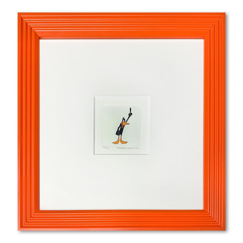 "Daffy Duck" Framed Limited Edition Etching with: "Daffy Duck" is a limited edition etching on paper with hand-tinted coloring from Warner Bros, numbered and dated 1999. This piece comes framed. Measures approximately 9" x 9" (with frame), 2" x 2" (i